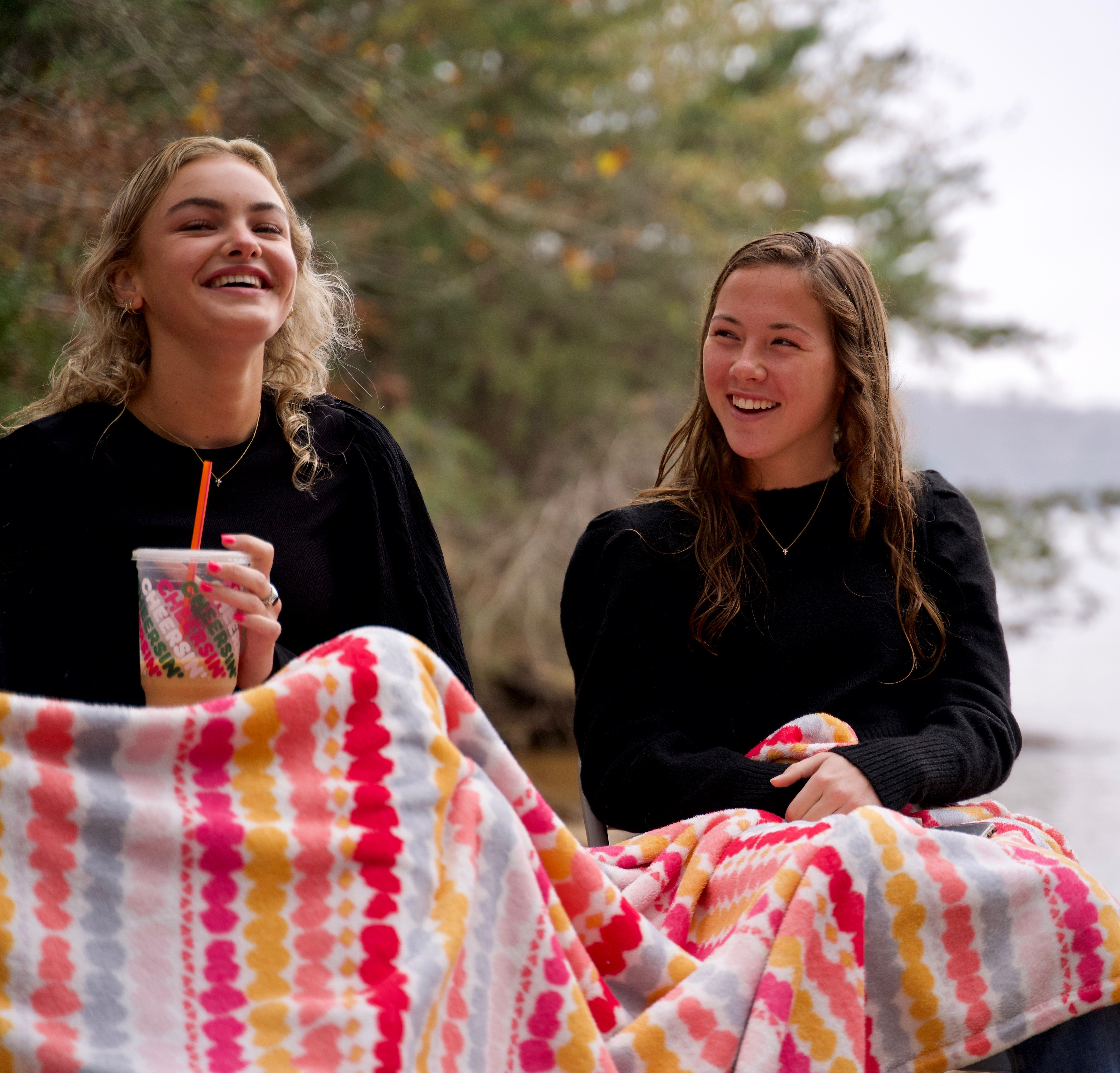 2 girls smiling at lake.jpg